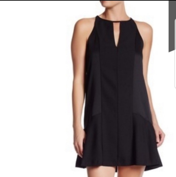 black peplum hem dress